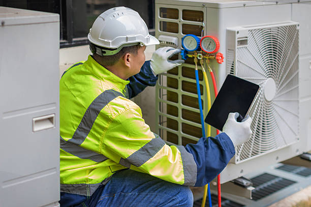 Professional Hvac technician working in Grafton, ND